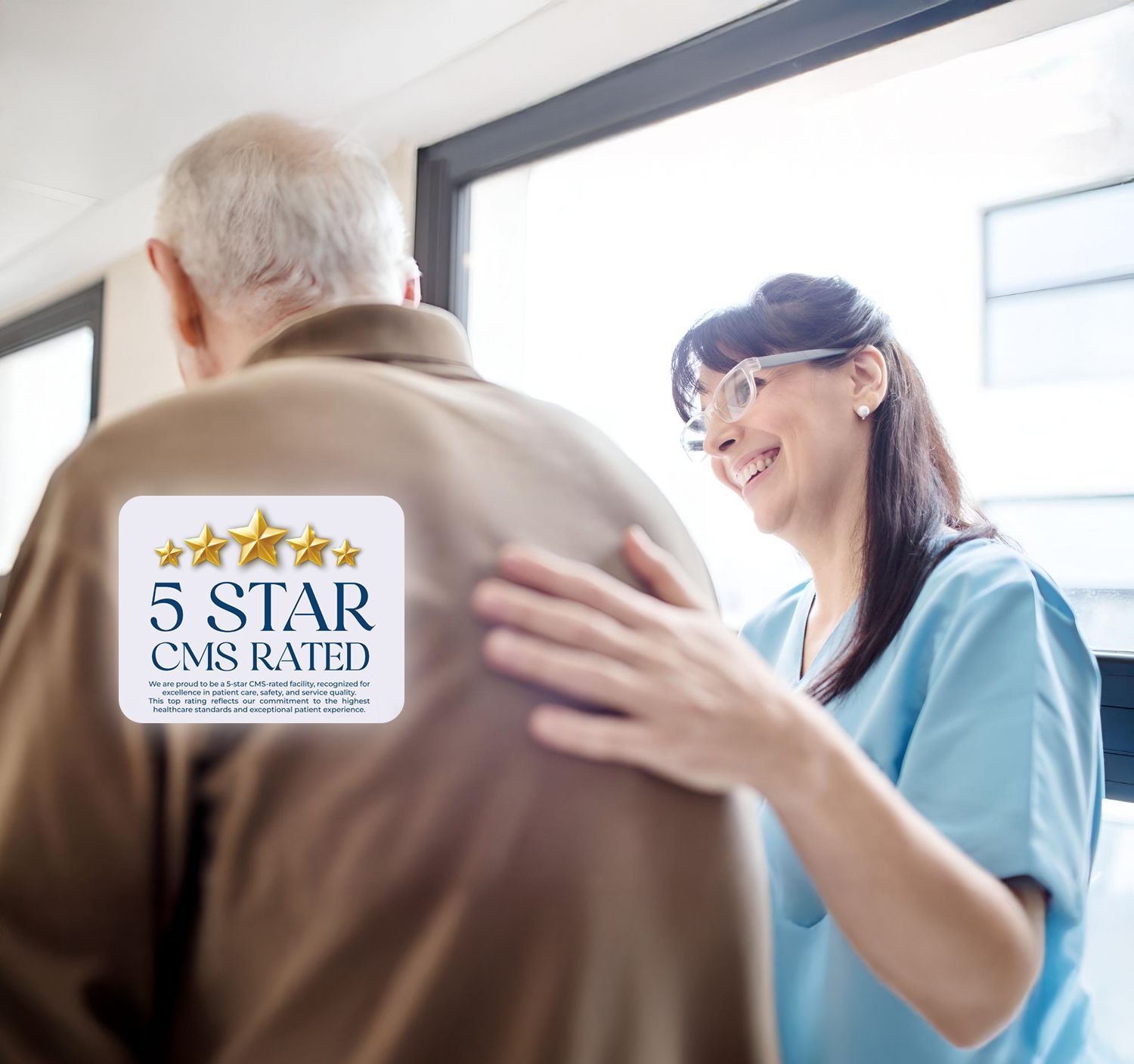 A nurse comforting an elderly resident at Monroe Springs Rehab
